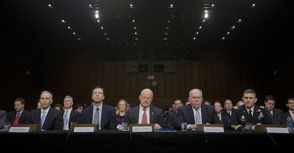 Director of National Intelligence James Clapper, center, and other officials testify on Capitol Hill last Wednesday at a Senate Intelligence Committee hearing on national security threats. From left: National Counterterrorism Center Director Matthew Olsen, FBI Director James Comey, Clapper, CIA Director John Brennan and Defense Intelligence Agency Director Lt. Gen. Michael Flynn. (AP/Pablo Martinez Monsivais) 