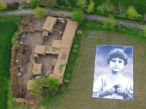 A poster bearing the image of a Pakistani girl whose parents, lawyers say, were killed in a drone strike, lies in a field at an undisclosed location in the northwestern Khyber-Pakhtunkhwa province. 