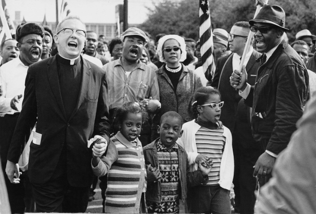 Martin Luther King, Jr., Ralph Abernathy and their wives, Coretta and Juanita, lead a march from Selma to Montgomery in 1965, with the Abernathy children on the front line. (Wikimedia Commons/Abernathy Family)