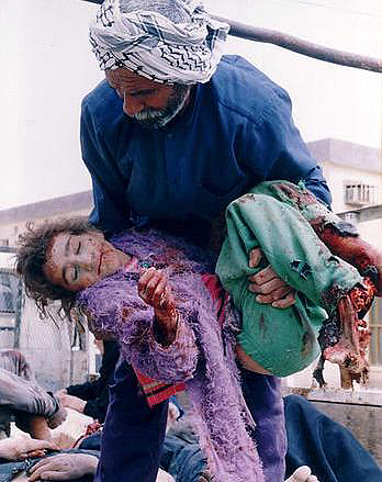 Father holding daughter in Fallujah.